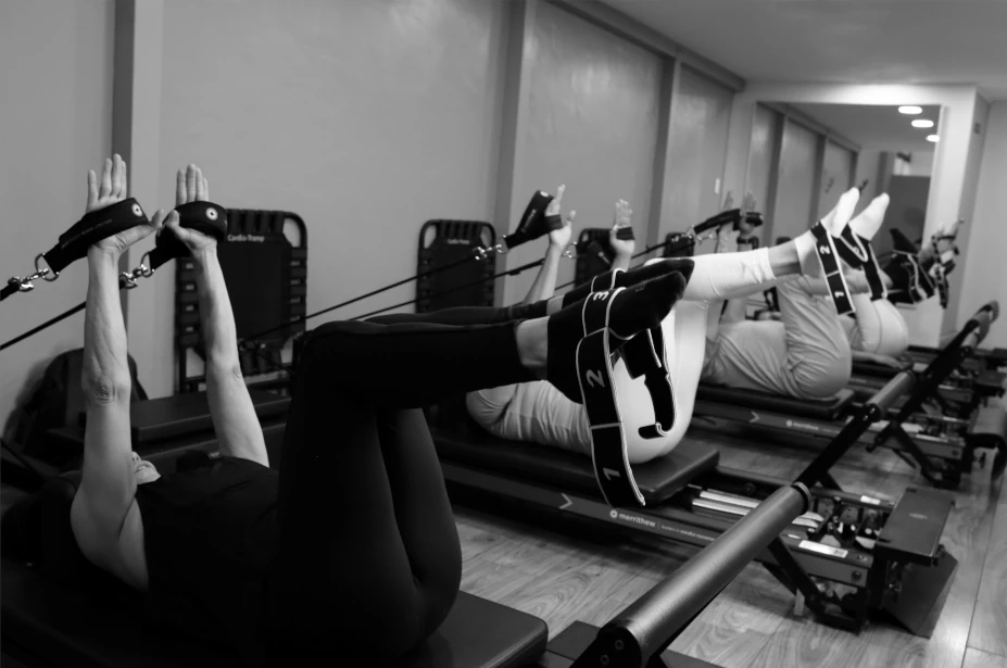 Clase de Pilates en reformer